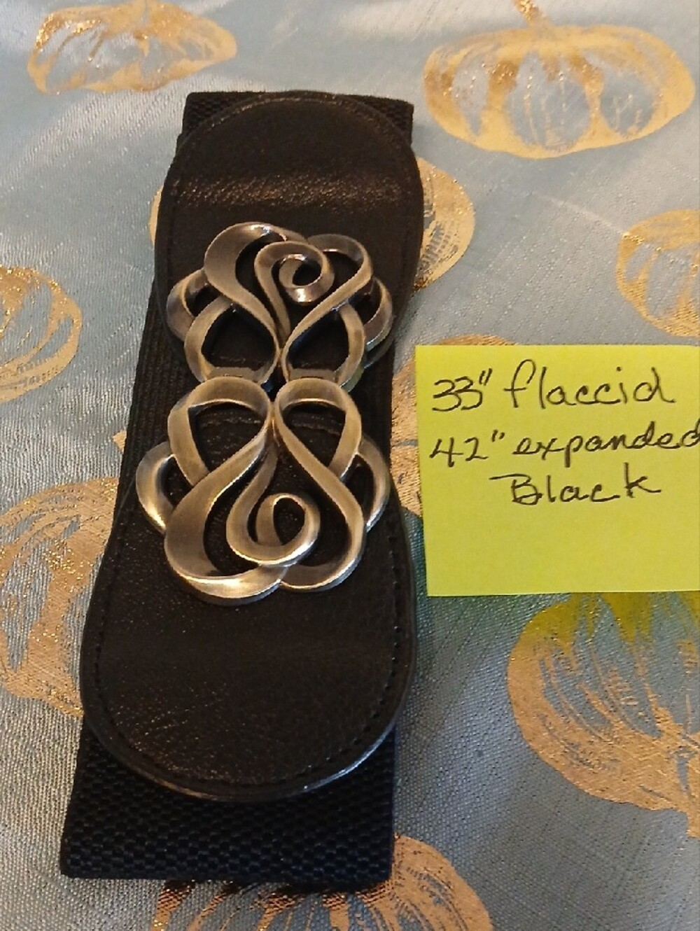 Black Elastic Waist Belt with Decorative Silver-Tone Floral Clasps